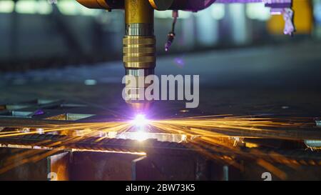 Plasma cut machine cutting steel sheet with sparks Stock Photo