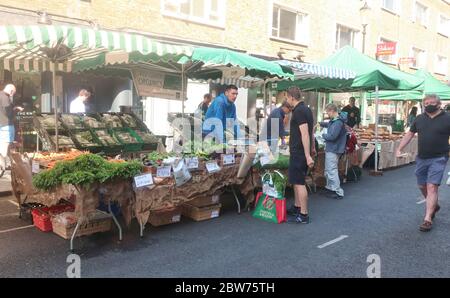 London, UK. 30th May, 2020. Farmers' Markets see upturn in business as lockdown eases and fine weather continues. Pictured Bute St Market, South Kensington. Credit: Brian Minkoff/Ģ����ý Live News Stock Photo