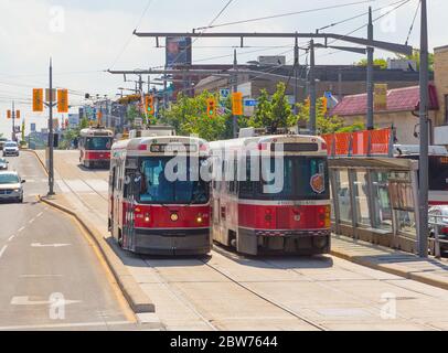 TORONTO, CANADA - 18TH JUNE 2015: Old Trams along St Clair Ave W during the day. People can be seen. Stock Photo