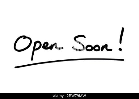 Open Soon! handwritten on a white background. Stock Photo