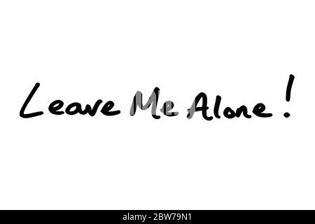 Leave Me Alone! handwritten on a white background. Stock Photo