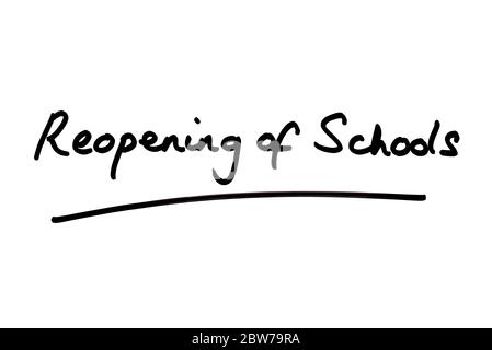 Reopening of Schools handwritten on a white background. Stock Photo