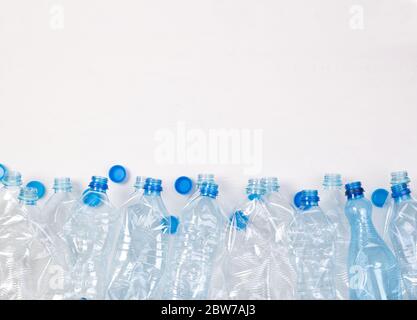 Plenty of plastic bottles on white background with copy space Stock Photo