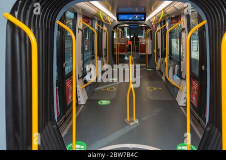 Sydney, Australia. Saturday 30th May 2020. A Sydney Tram at Circular Quay showing social distancing signage on seats and floor areas for passengers as Covid -19 resrictions ease. Credit Paul Lovelace/ Alamy Live News Stock Photo