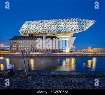 A view on the Antwerp Port House building from Zaha Hadid just after sunset. Stock Photo