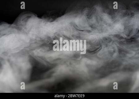 Abstract Smoke In Dark Background Stock Photo