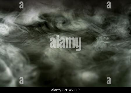 Abstract Smoke In Dark Background Stock Photo