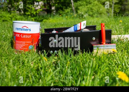 City Cesis, Latvia. Paint bucket and painting machine.29.05.2020 Stock Photo