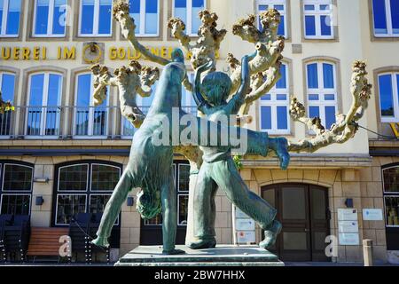 Cartwheeler Fountain in Old Town. Cartwheeling is a historic tradition in Düsseldorf and the city's main symbol, still to be found on many souvenirs. Stock Photo
