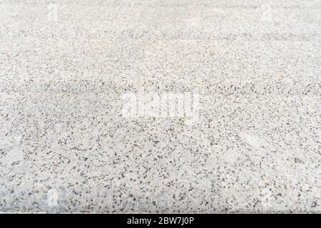 texture of the plaster with fine particles of sand and cement. Stock Photo
