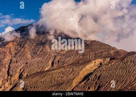 Large clouds covering the snowy peaks in Leh, India Stock Photo