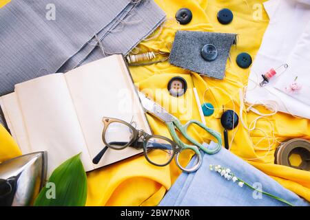 Creative sewing vintage old supplies on yellow cloth Stock Photo