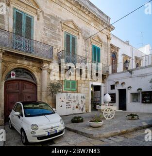 OSTUNI, APULIA, ITALY - MARCH 28th, 2018: The small square in the center of Ostuni - the white city, Puglia, Italy Stock Photo