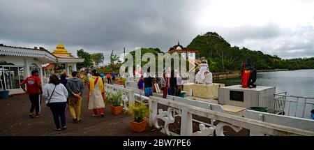 MAURITIUS - AUGUST 18, 2018: Hindu Temple and Ganga Talao. Crater lake at Grand Bassin. It is the most sacred Hindu place in Mauritius. Stock Photo