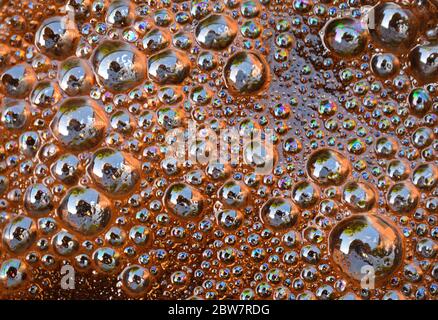 Black Guatemalan coffee foam bubbles from above in French press cafetiere South American sweet moderately acidic coffees with plenty chocolate flavour Stock Photo