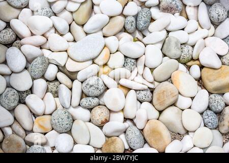 Abstract smooth round pebbles sea texture background. Abstract nature pebbles background. Blue pebbles texture Stock Photo