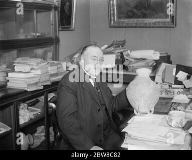 The Glozel ' Hoax ' view of Famous French scientist . M Rene Dussaud photographed in his bureau . 29 October 1929 Stock Photo