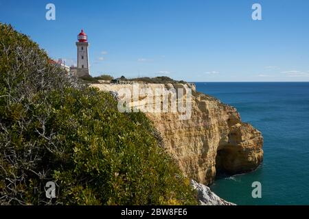 Farol de Alfanzina Lighthouse landscape in Algarve, Portugal Stock Photo