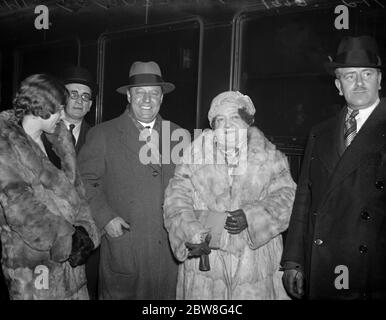 Madame Tetrazzini to sing in London again for charity at the Royal Albert Hall concert in aid of the safer motherhood appeal . Mme Tetrazzini on arrival at Victoria . 6 December 1932 Stock Photo