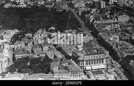 Bucharest , Romania : An aerial view showing in the foreground the intersection of the Calea Victoriei with the Boulevard Elizabeth . The large building in the foreground is the Military Club . 21 February 1929 Stock Photo