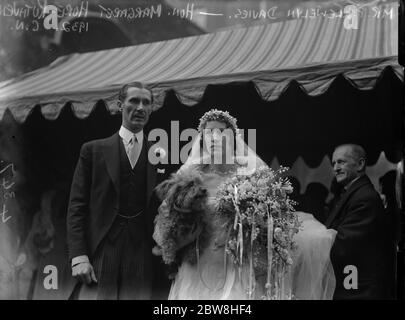 Society wedding at Savoy Chapel . The marriage between Mr P Llewelyn Davies and the Hon Margaret Hore Ruthven . The bride and bridegroom leaving after the ceremony . 10 March 1932 Stock Photo