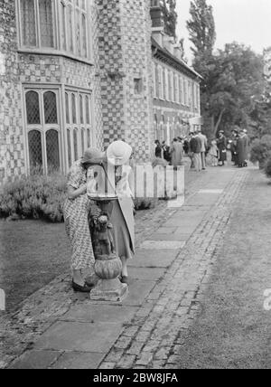 Members of the public in the grounds of Hall Place , Bexley , Kent . 1937 Stock Photo