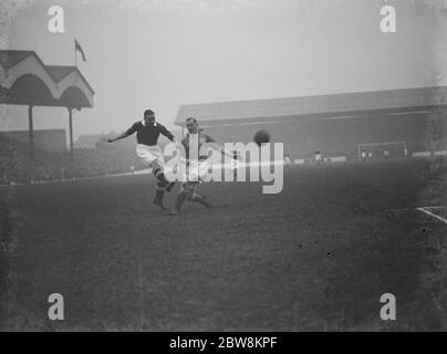 Charlton Athletic football club versus Leeds United football club . Trying the attacker . 22 January 1938 Stock Photo