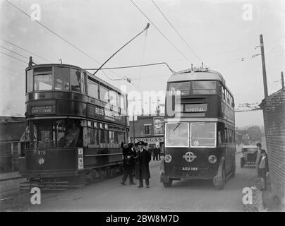 Trolley bus and tram , Welling , South East London . 1935 Stock Photo