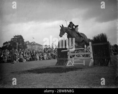 The Eltham and Bromley gymkhama . Miss M P Rice Horse jumping competition . 1938 Stock Photo