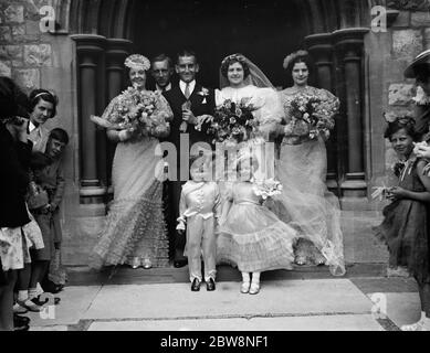 The wedding of Mr A W Gross and Miss D Smith . The Bride and bridegroom with the bridesmaids . 1938 Stock Photo