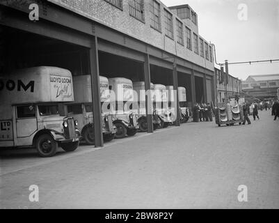 The forecourt of Lloyd loom , lusty furniture produce factory , The Bedford lorrys wait for the jobs . 1938 Stock Photo