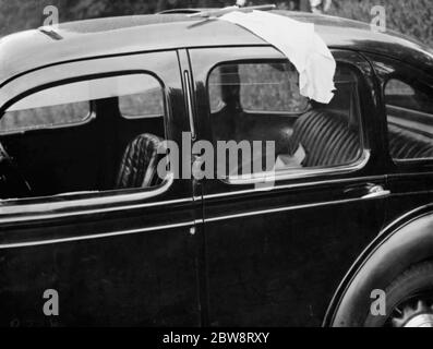 The abandoned getaway car that was used in the Downe post office robbery . 8 September 1938 . Stock Photo