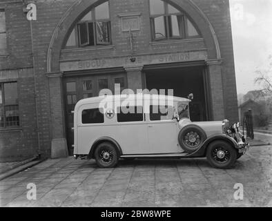 A new ambulance , parked outside Sidcup fire station , Kent . 1937 Stock Photo