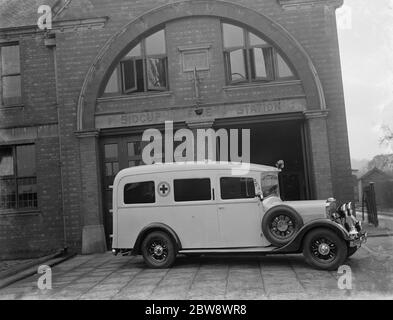 A new ambulance , parked outside Sidcup fire station , Kent . 1937 Stock Photo