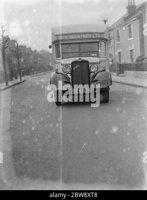 A Bedford truck belonging to Vack Industries Ltd from Kingston upon Thames , London . The truck has been converted into a mobile showroom for their oil burning apparatus and other domestic appliances . 1937 . Stock Photo