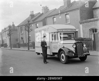 A Bedford truck belonging to Vack Industries Ltd from Kingston upon Thames , London , which has been converted into a mobile showroom for their oil burning apparatus and other domestic appliances . 1937 . Stock Photo
