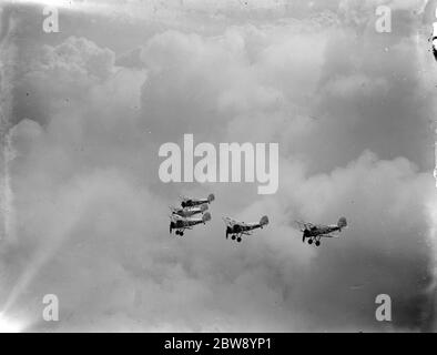 RAF Empire air day rehearsal , Biggin Hill , Kent . Pilots of 32 and 79 squadron fly their gloster gauntlet fighters in the renowned tight formation . 1937 Stock Photo