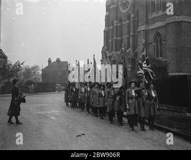 Girl guides during their church parade in front of the Parish Church of St John the Evangelist in Sidcup , Kent . 14 May 1937 Stock Photo