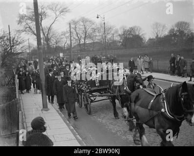 The funeral procession of of farmer MR L Bruce Gibson in East Wickham . 25 February 1939 Stock Photo