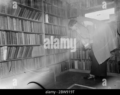 A woman visiting the Kent County mobile library . 1939 Stock Photo