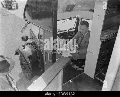 Visiting the Kent County mobile library . 1939 Stock Photo