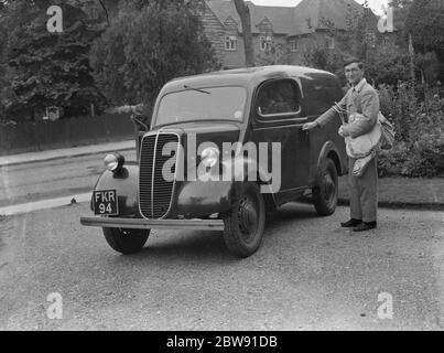 Mr R L G Ford , a field entomologist , getting in to his mobile labratory . 1939 Stock Photo