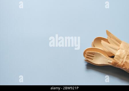 Spoons, forks, knives made of wood. Eco-friendly tableware. Stock Photo