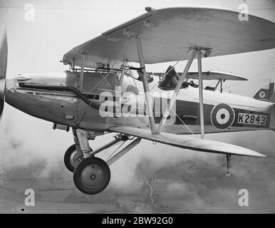 A Hawker Demon of No. 23 Squadron RAF fly in tight formation . 1939 Stock Photo