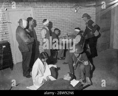 An emergency underground hospital in Erith , London . Checking out the ' paitents ' during a training drill . 1939 Stock Photo