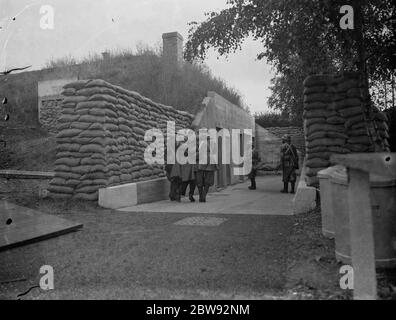 An emergency underground hospital in Erith , London . Bringing in a ' casualty ' through the main entrance during a training drill . 1939 Stock Photo