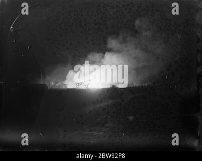 Flames and smoke coming from a fire at the tannery in Dartford , Kent . The photo was taken from 4 miles away . 3 October 1939 Stock Photo