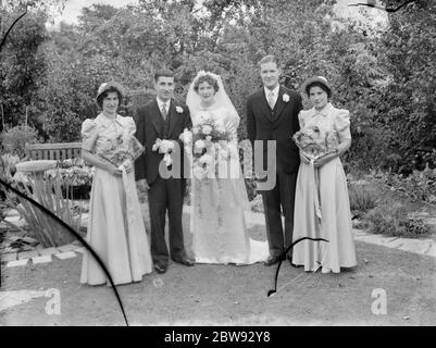 The wedding of Mr Francis William Elliston Erwood and Miss Vidam Cotton Cory in Sidcup , Kent . The bridal group . 1939 Stock Photo