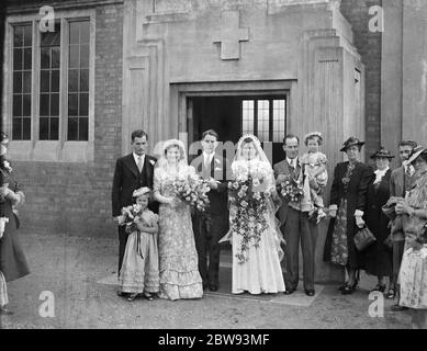 The wedding of Miss E M Irons and Mr H T Rabbit . The wedding group . 1939 Stock Photo