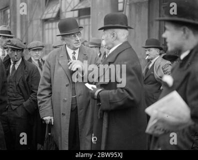 Sir Frederick Wall at Wembley . Sir Frederick Wall , Secretary of the Football Association , chatting with Mr R H Mellet at Wembley Stadium when he inspected the Cup Final pitch before the match between Arsenal Football Club and Newcastle United football club . 25 April 1932 . Stock Photo